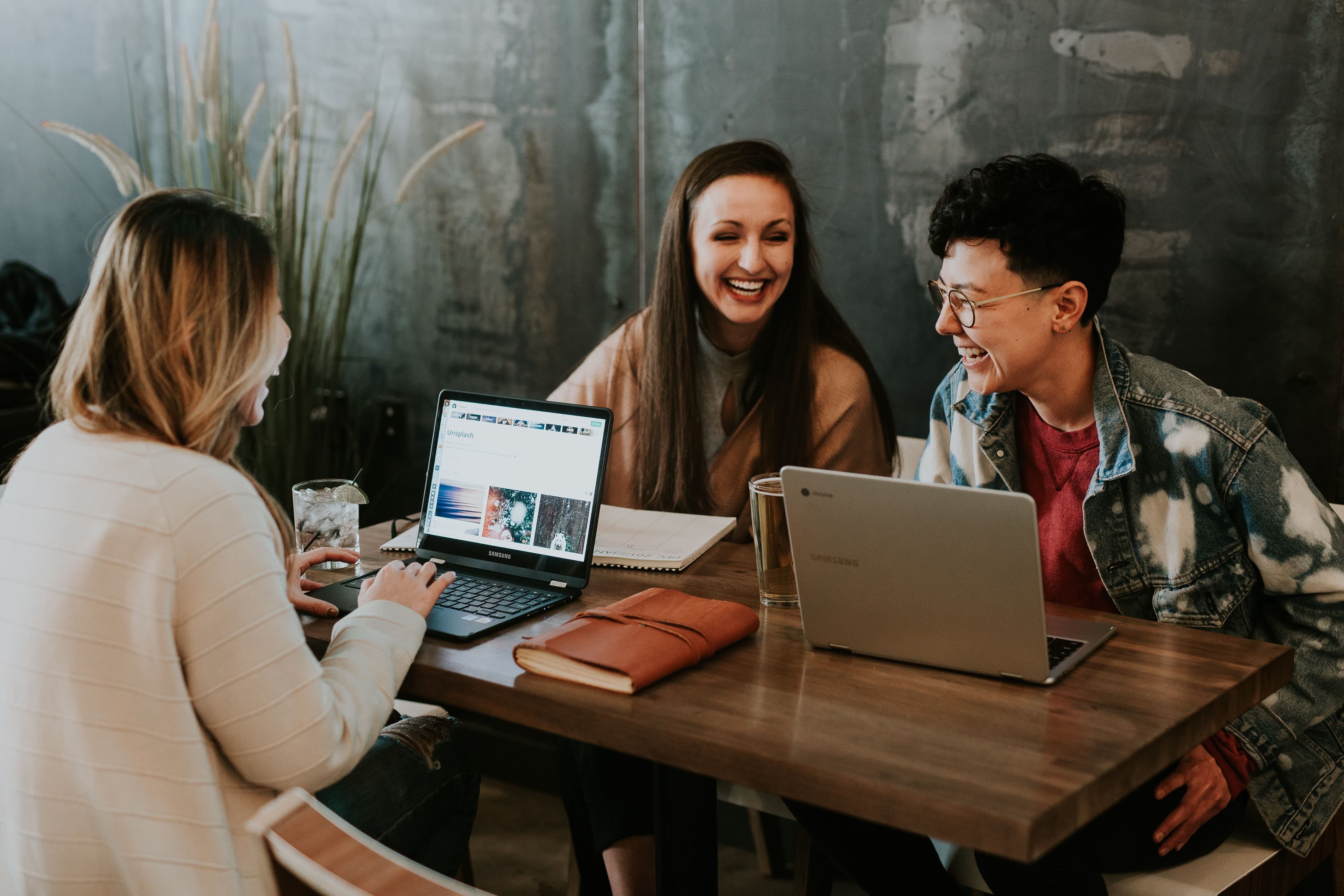 An image depicting a group of people from different backgrounds collaborating and working together as a team.